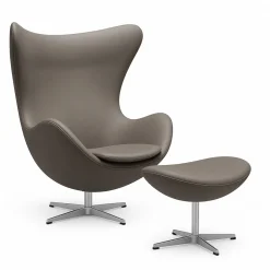 Ægget, Cognac Aura læder, med returdrej inkl. skammel af Arne Jacobsen<Fritz Hansen Best