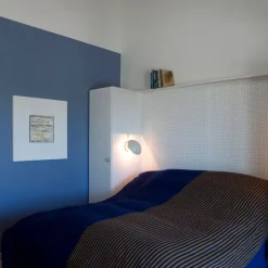 PH Hat væglampe fra<Louis Poulsen Online